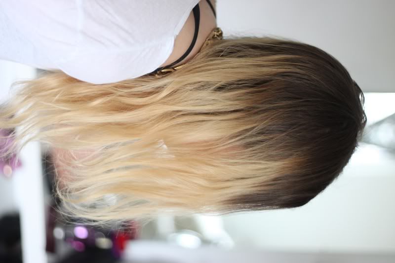 bleach blonde hair with dark roots. grow out my londe hair to