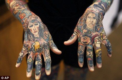 wanita dengan tatto terbanyak di dunia